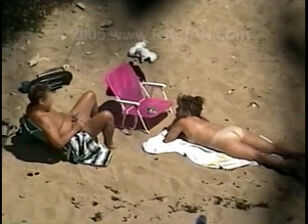 Nudist families at the beach